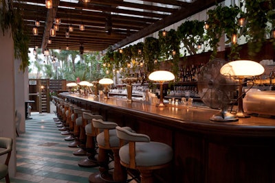 Cecconi's bar is lined with old-fashioned stools and vintage lamps.