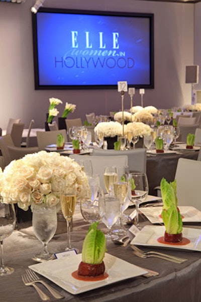 All-white flowers from R. Jack Balthazar and platinum linens topped the tables.