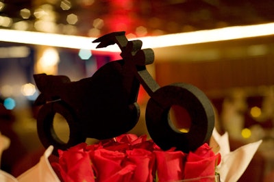 Floral designers at Five Stars topped the rose centerpieces on the Water Fantaseas' yacht with foam cutouts of motorcycles.