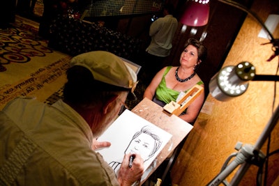 Two caricaturists provided takeaway portraits.