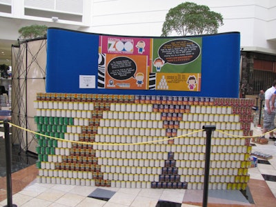 Canstruction volunteers used 976 cans to create the logo of the Central Florida Zoo and Botanical Gardens.