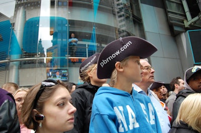 Onlookers, which included crowds on the street as well as a cluster of people at the Nasdaq MarketSite, were given branded hats for the occasion.