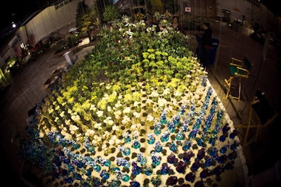 Philadelphia-based Beautiful Blooms used more than 500 vases and a metal grid to create a hanging topographic map at the 2010 Philadelphia Flower Show.
