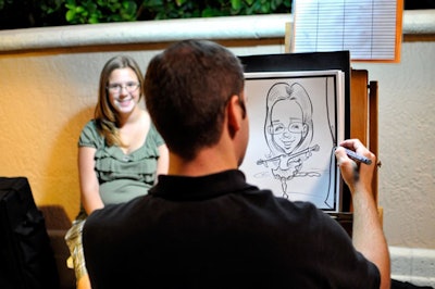 Two caricaturists created keepsakes for attendees.