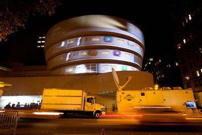 Two 35,000-lumen projectors, one hitting the Guggenheim from the left and one from the right, were used over a two-day period to project nearly 100 artists' videos onto the museum's facade. Lifts stationed opposite the museum along the west side of Fifth Avenue elevated the projectors 18 feet above ground.