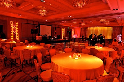 The Mandarin Oriental ballroom was awash in red light.