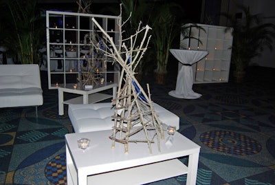 The decor was a classic and clean Miami Beach palette with modern, white leather furniture and candles. Students from Miami's Terra Environmental Research Institute used dried tree branches to create sculptures for each table.