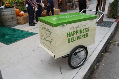 Started as a mail-order business, Harry & David's tagline is 'Happiness Delivered,' a phrase that adorned components of the temporary stores, including bicycle carts placed out front.