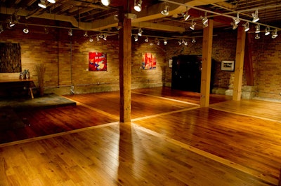 The venue houses two levels with loft-style event facilities, complete with hardwood floors, exposed brick walls, original wood beams, and 12-foot ceilings.