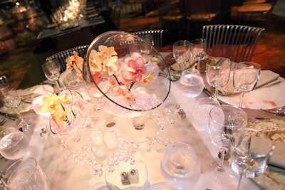 The circular tables had all-glass tops and glass centerpieces that mirrored the Mead Center's all-glass facade.