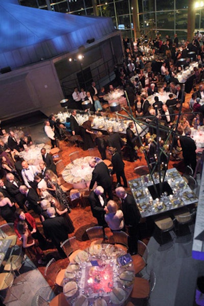 During the performance, the concourse level was transformed from an open cocktail-reception space to the main dining area for the seated dinner.