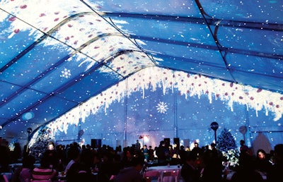 Large-scale projections brought a winter setting to sunny Los Angeles for DirecTV's annual holiday party. Firefly LA and the Hand Company projected snow-covered forests, icicles, and other scenes onto a 120- by 140-foot tent on DirecTV's campus.