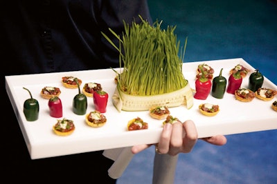At a holiday party hosted by Style Boston and Boston Magazine, the Catered Affair served tuna tartare with wasabi aioli on a tray accented with wheatgrass and peppers—traditional Christmas colors on unexpected objects.