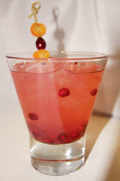 Blue Plate's Red Sombrero incorporates tequila, Sprite, pink grapefruit juice, kumquats, and pomegranate seeds.