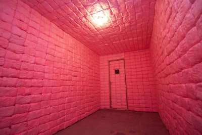 Artist Jennifer Rubell created a cell padded with edible cotton candy.