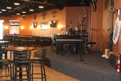 Baby Grands Dueling Piano Bar offers salads, sandwiches, burgers, and wings on its regular menu, but there is a separate catering menu for private events.