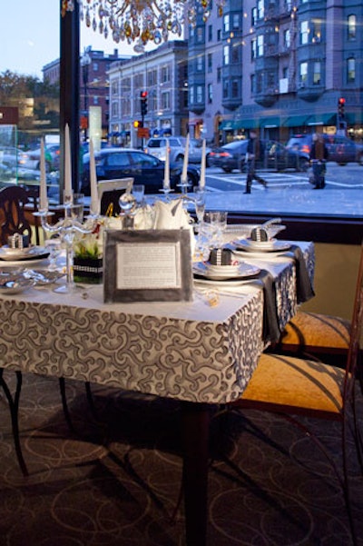 A table in Shreve's first-floor window, designed by Michael Ferzoco of Eleven Interiors, used a palette of silver and white with crimson accents.