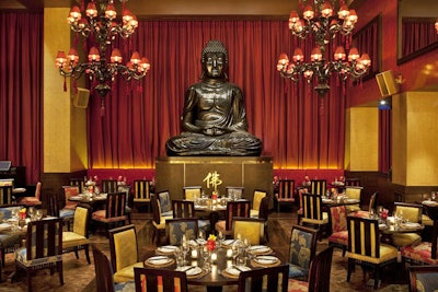 An 18-foot-tall Buddha sculpture anchors the 170-seat dining room at the Washington outpost of Buddha Bar.