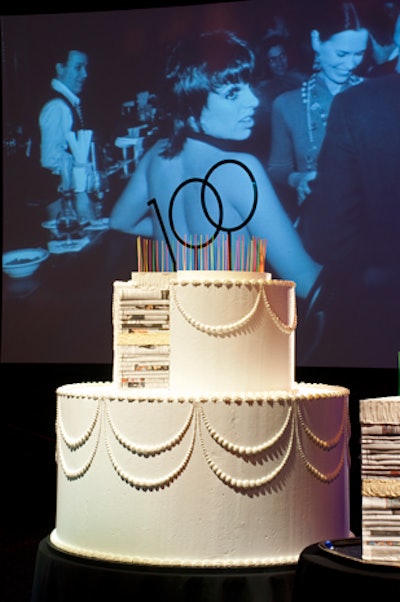 A fake cake had a filling of WWD issues, and the motion-sensor wall displayed images from the commemorative issue.