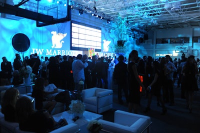 During the party, guests mingled in the arena section of the 19th floor, which was simultaneously used as a basketball court and carpeted event space.