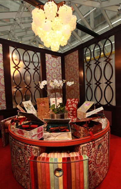 Asian influence appeared in Kravet Inc.'s table, which housed place settings in fabric-covered boxes.