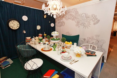 Coalesse by HDR created a whimsical tea-party setting, replete with a daisy cake, upside-down teacups, and mismatched furniture.