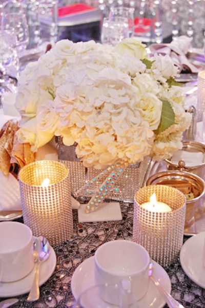 Sparkling jewels incorporated into the floral arrangements and sequined table numbers created a glittery effect in the dining room.
