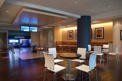 Guests at the new JW Marriott Marquis can choose from a variety of activities in the entertainment and lifestyle complex, including basketball, tennis, billiards, virtual golf, and bowling.