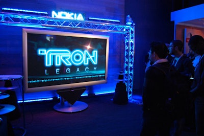 Event organizers connected an N8 phone to Bang & Olufsen's 103-inch plasma screen to play the trailer for the upcoming Disney film Tron: Legacy.