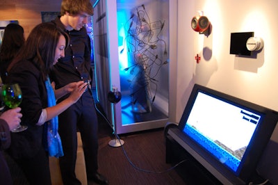 Guests could visit stations to check out the phone's mapping, gaming, and camera applications during the launch party.