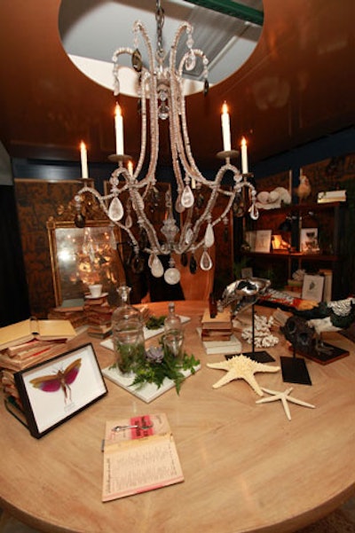 Butterflies appeared in several displays. At the table from Holly Hunt by Gensler, the nature theme extended to include starfish and birds.