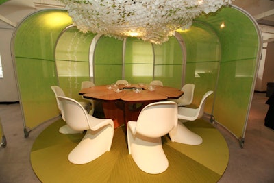 Asian inspiration played into several decor schemes. An origami-like structure crowned the table from Halcon and Carnegie Fabrics by OWP/P Cannon Design.