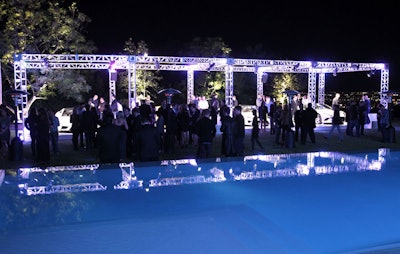 A private mansion, complete with infinity pool and views, was the event's backdrop.