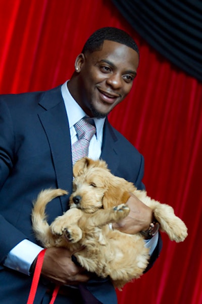 Dinner with Washington Redskins running back Clinton Portis, pictured, and a Goldendoodle puppy were two of the live-auction lots at Knock Out Abuse.