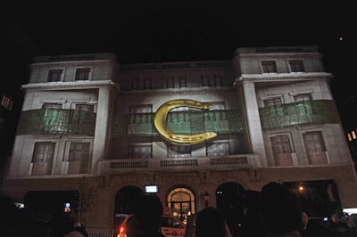 The groundbreaking light installation involved 15 scenes in eight-minute presentations, taking the audience on a visual journey through the world of Ralph Lauren. The technology used was designed to give the illusion of images extending beyond the building and floating toward the audience.