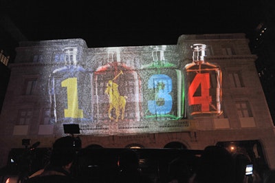 Working with fragrance partner L'Oréal, the event's producers released vaporized scents from machines placed around the perimeter of the viewing areas. Monitored to ensure the appropriate amount of oil-based mist was released, the diffusion was timed to the moment when images of the brand's new Big Pony collection splashed across the facades.