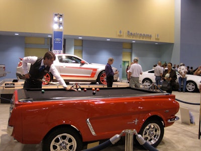 As part of their exhibit, Ford set up a 1965 Mustang-turned-pool table.