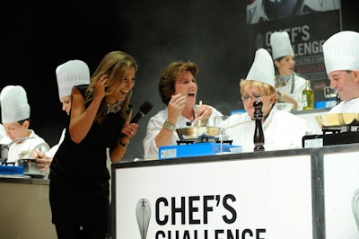 Chef Lynn Crawford—whose team won the event—assisted her group in preparing three dishes, including braised Pacific halibut, fillet of Ontario Angus beef, and honey crème brûlée.