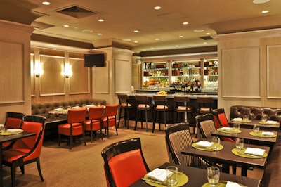 One of restaurant's two full bars is in the library, which offers an intimate dining and cocktail space.
