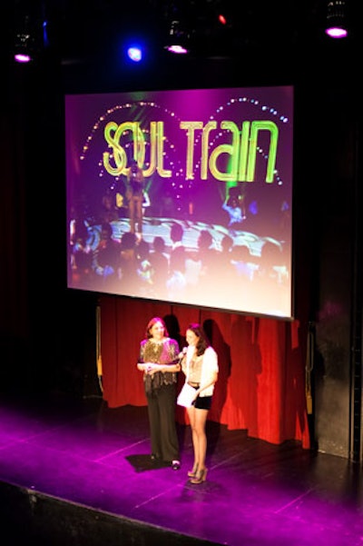 Event chair Maegen Holt thanked guests and event sponsors on Oberon's stage as Soul Train clips played on a large screen.