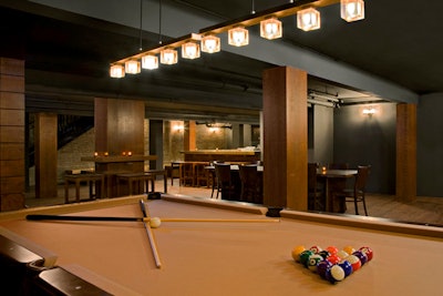 The lower level offers a pool table.