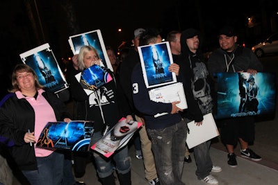 Fans displayed movie posters on opening night.