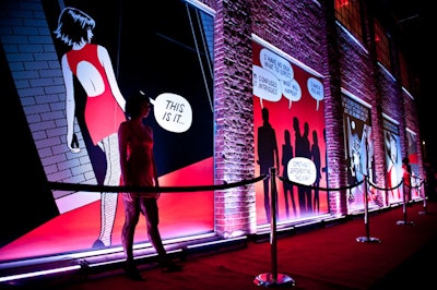 For the Smirnoff Experience, held at Andrew Richard Designs in July, the event management team at Mosaic Experiential Marketing placed graphic illustrations—depicting comic book characters arriving at a party—in the windows of the venue.