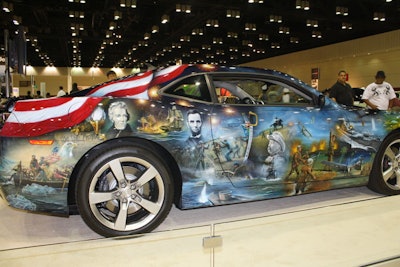 The 'American Pride' Camaro is a 2011 model painted with a pictorial tribute to American history and military heroes.
