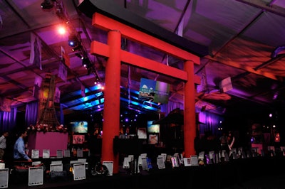The auction tent, set up by EventStar, had black-and-white iconic images hanging from the ceiling, accented with large props to represent Egypt's Sphinx, India's Taj Mahal , England's Big Ben, France's Eiffel Tower, and the United State's Statue of Liberty, among others.
