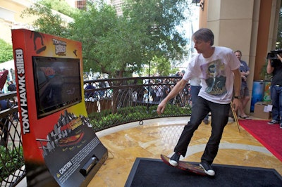 Stations throughout the space offered a chance to demo Tony Hawk: Shred, the motion-sensing skateboard/snowboard video game inspired by Hawk.