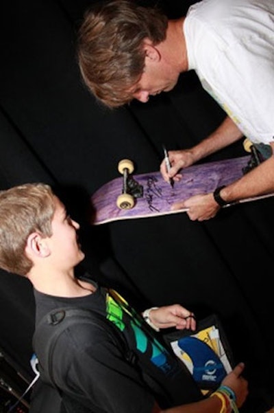 Hawk signed boards for fans.