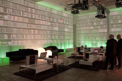 In one lounge, floor-to-ceiling images of books was used to create a cozy, library-like environment for attendees to play with the Clear.fi software.