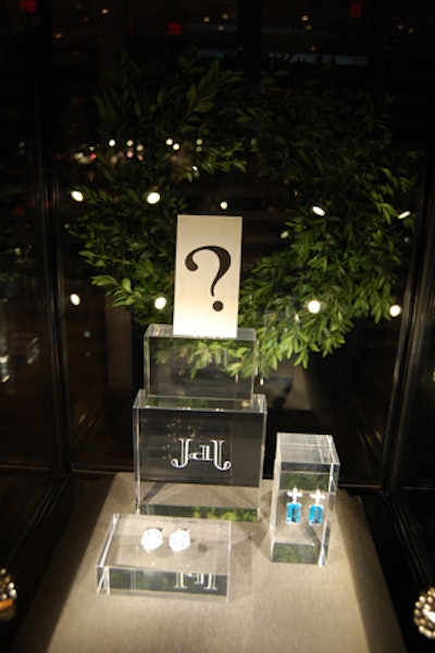 Jewelry from John de Jong's new collection replaced question mark cards in the display cases following the unveiling.