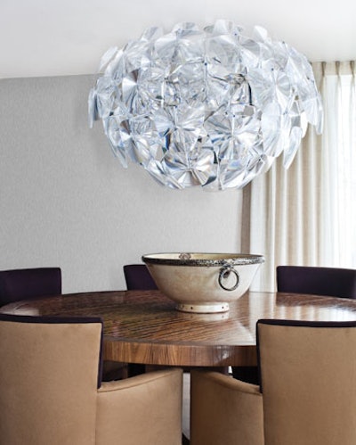 A high-design dining room is among the many spaces in the sprawling 9,000-square-foot property.